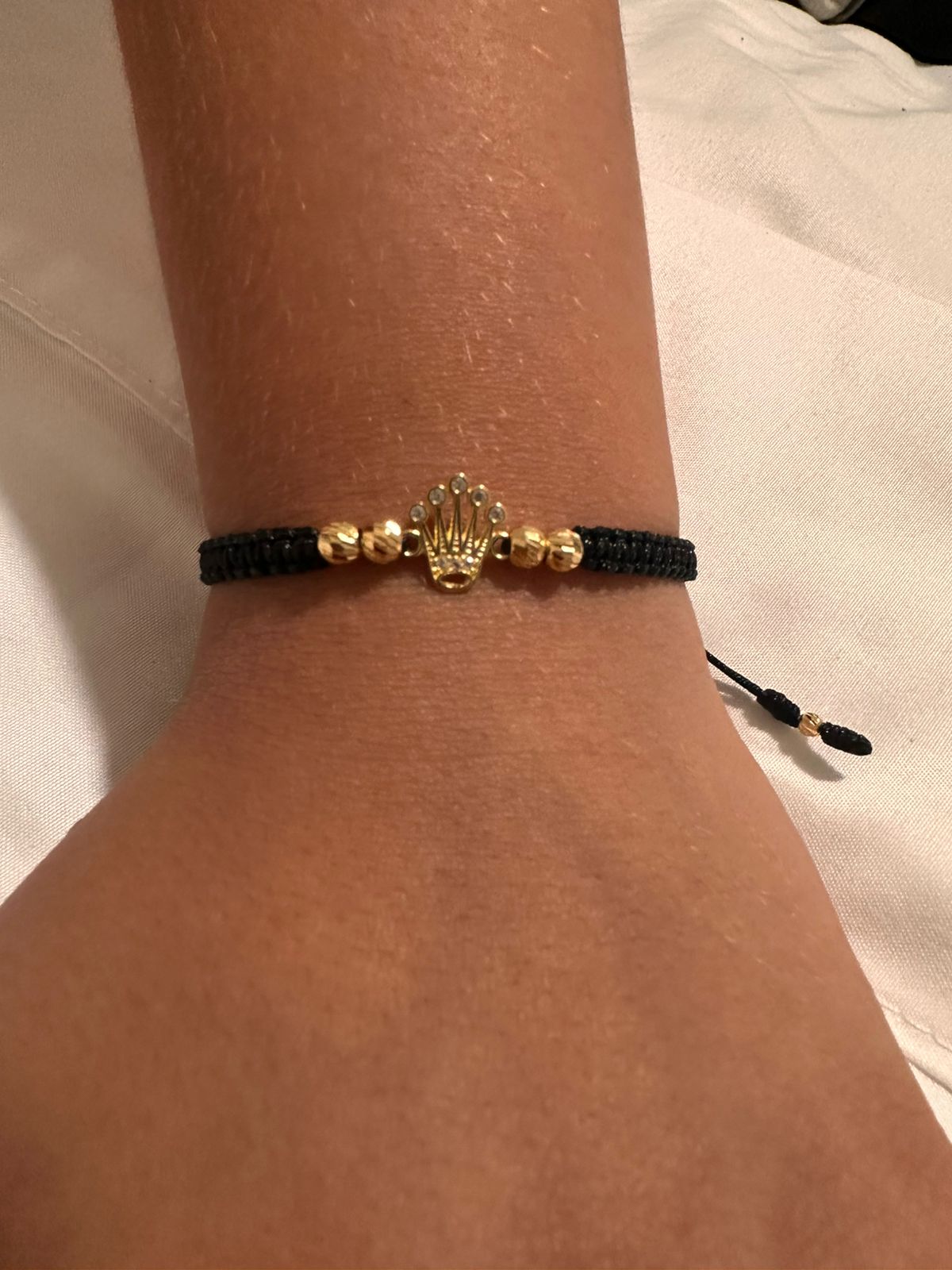 Pulsera tejida con dije Rolex 18k